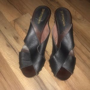 Sexy black leather strap sandals.